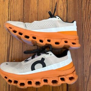 On Running Athletic Shoes in Cream and Orange
